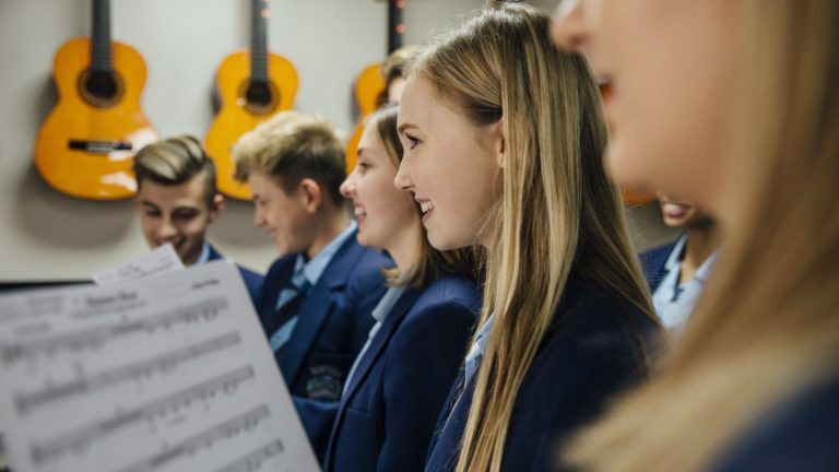 teenagers school singing